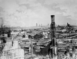 The aftermath of the Great Chicago Fire of 1871. A few charred buildings and rumble